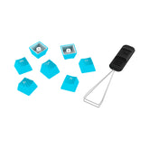 scattered view of HyperX rubber keycaps in blue with keycap removal tool